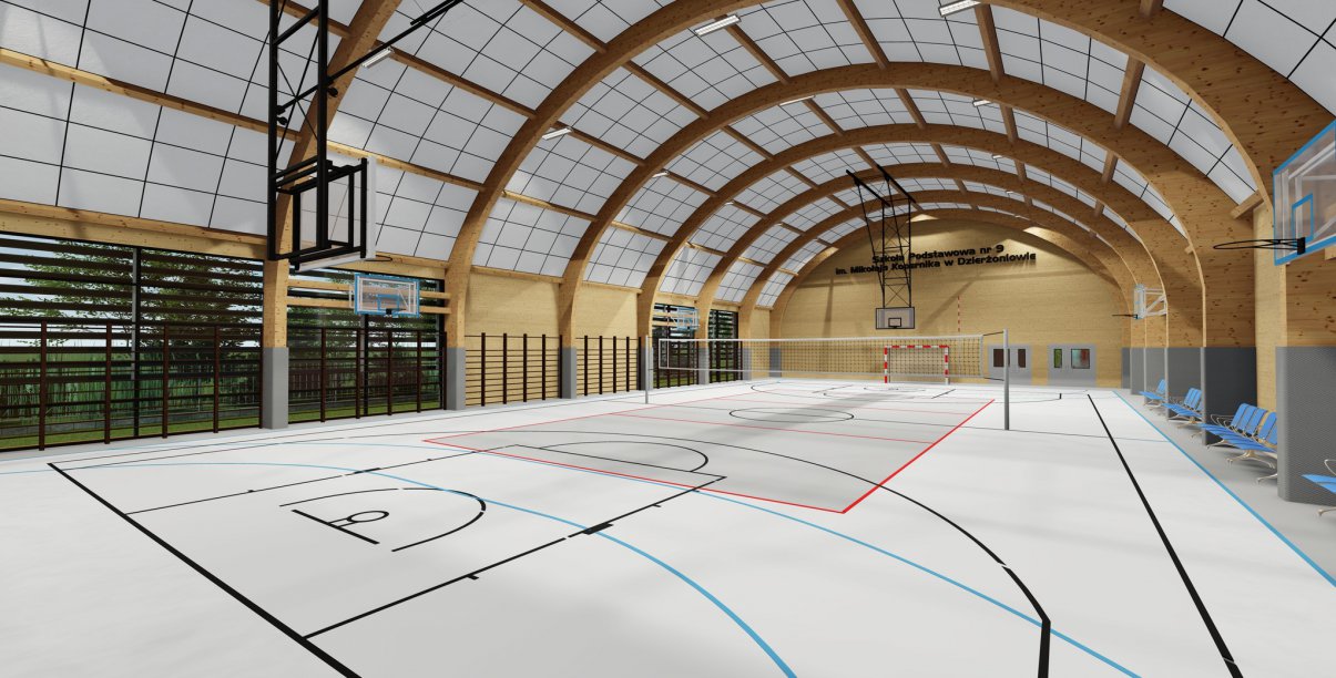 Wnętrze hali sportowej owalnym dachem i białym parkietem