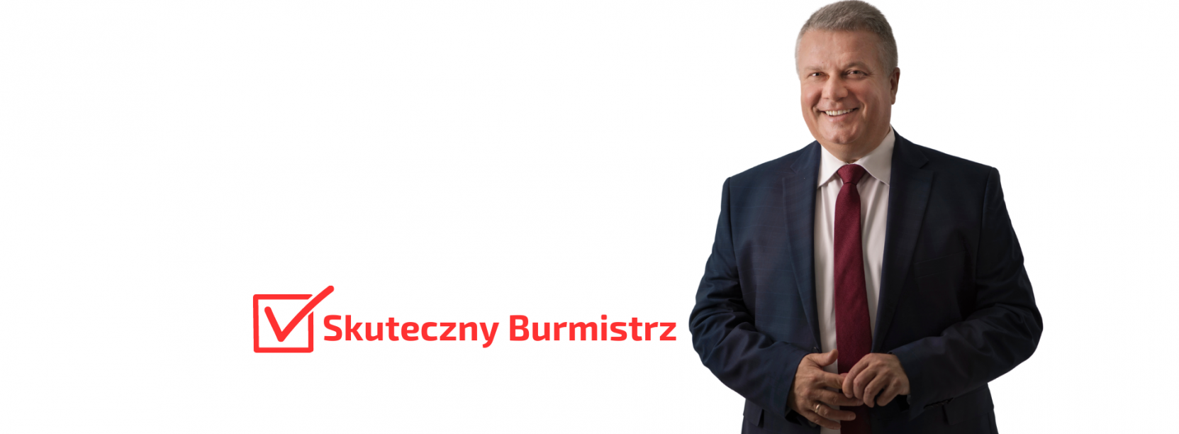 Uśmiechnięty mężczyzna w marynarce i bordowym krawacie, obo napis "Skuteczny burmistrz"