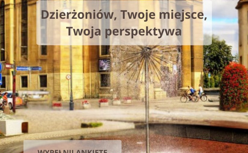 Fragment miasta, z kościołem i fontanną, na zdjećiu napis Dzierżoniów, Twoje miejsce, Twoja perspektywa