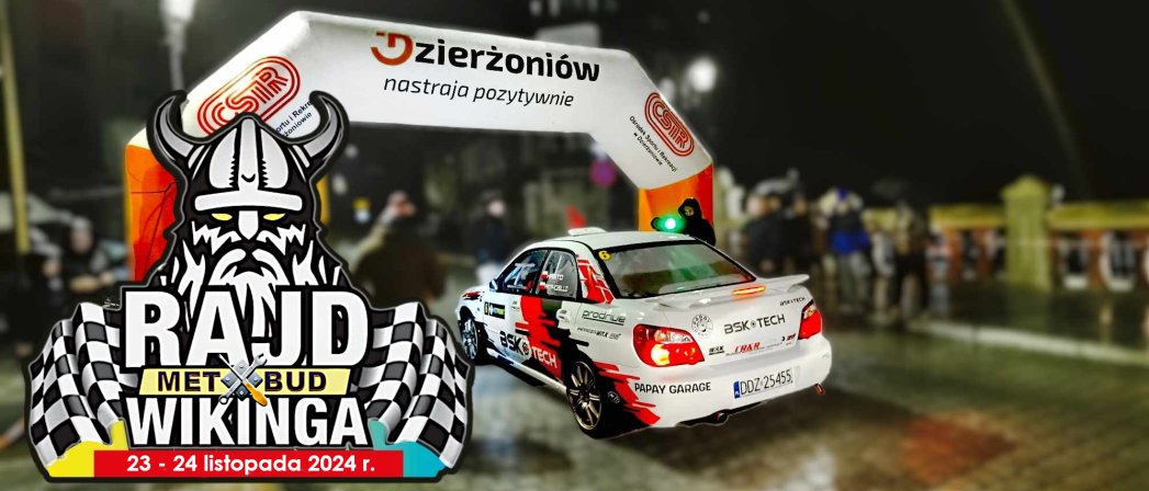 Samochód rajdowy przy mecie z logotypem miasta